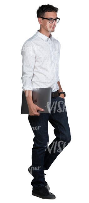 man with a laptop walking