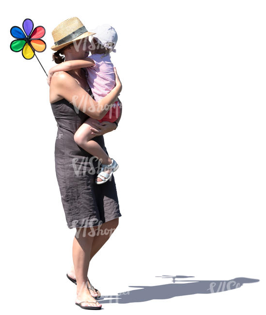 woman walking while carrying her daughter