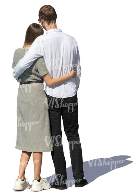 man and woman standing and holding each other