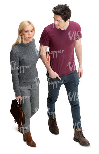 man and woman walking arm in arm seen from above