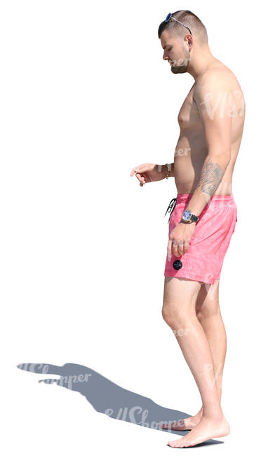 man in swim shorts standing