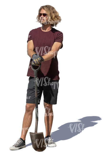 man with a spade standing