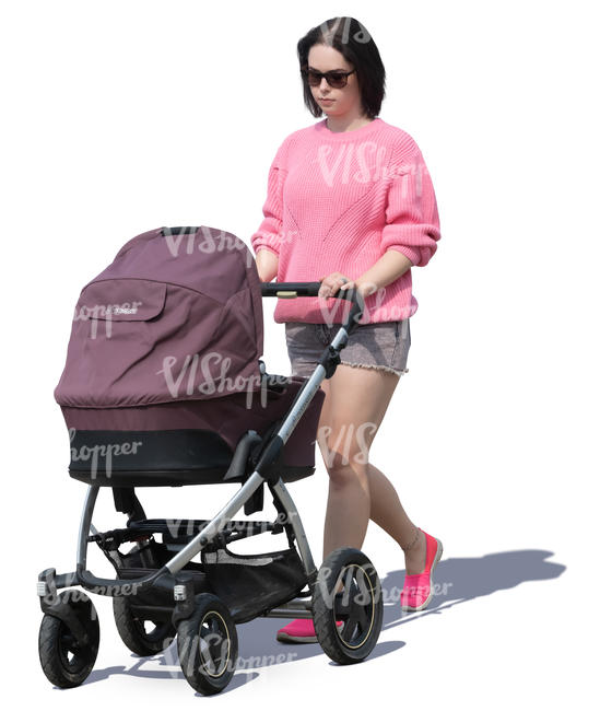 woman with a baby carriage walking