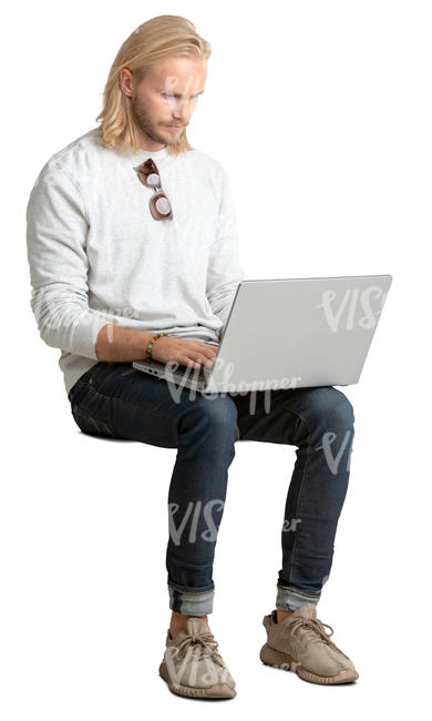 man sitting and working on his laptop