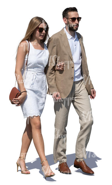 man and woman in fancy summer outfits walking