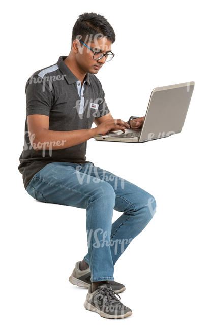 young man sitting and working