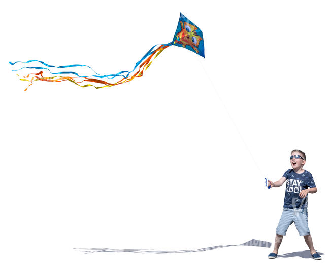 little boy playing with a kite