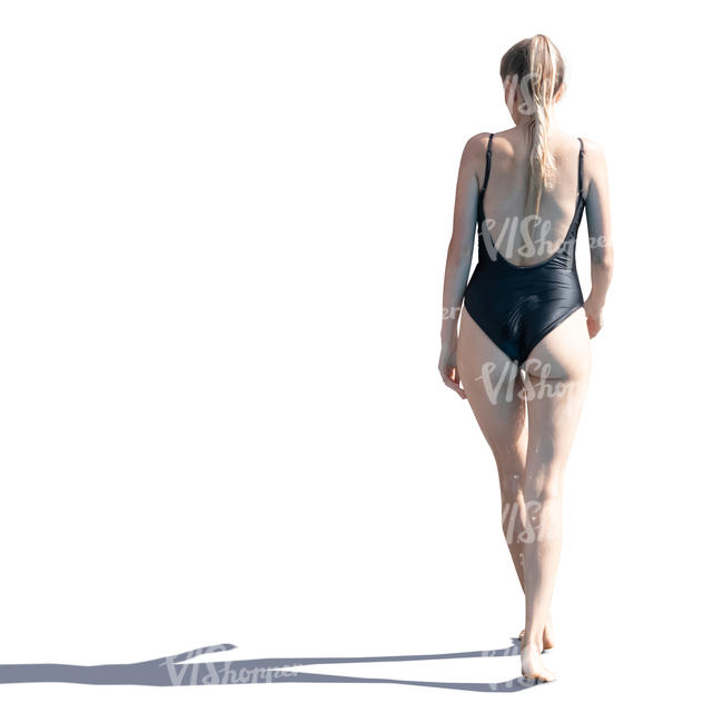 woman in a black bathing suit walking