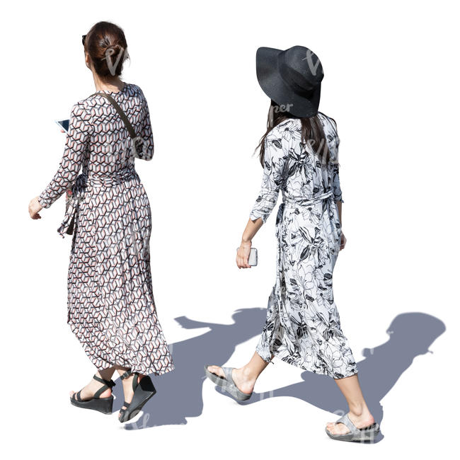 two women in summer dresses walking seen from above