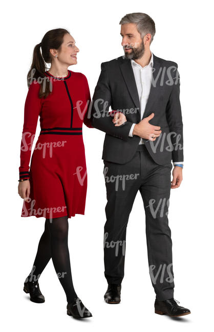 couple in formal clothes walking arm in arm