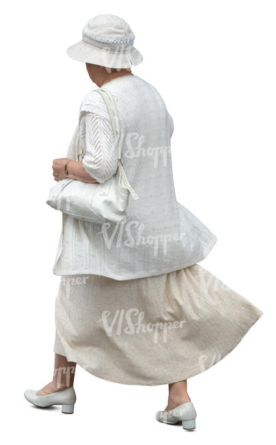 older woman in a white summer costume walking