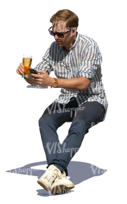 man sitting and drinking beer on a sunny day