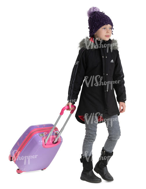 little girl in a winter coat pulling a suitcase