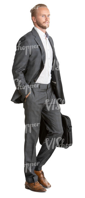 man in a grey suit walking