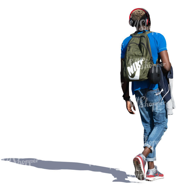 black man with headphones walking