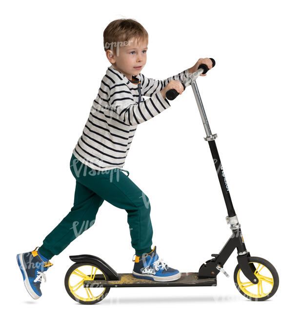 boy riding a scooter