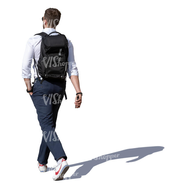 young man walking on a sunny day 