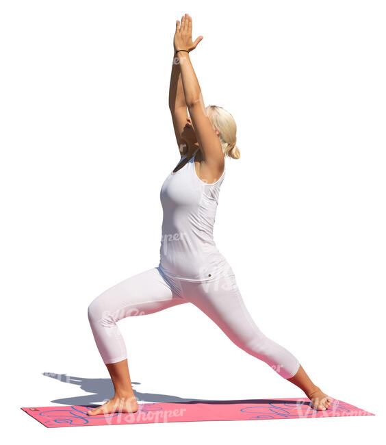 woman in a white sports outfit doing yoga