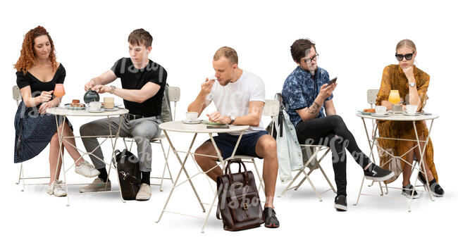 group of people sitting in a cafe