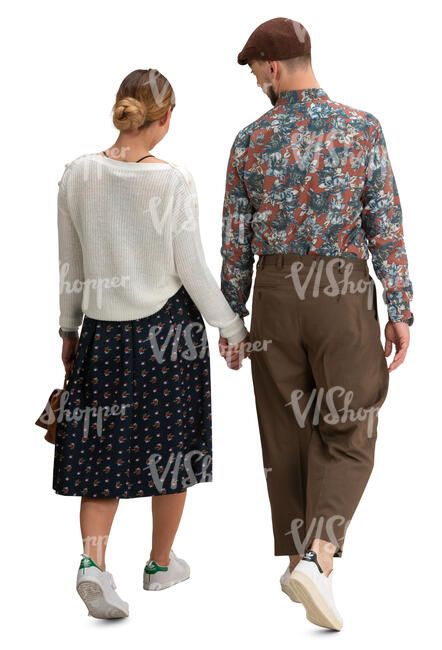 man and woman walking hand in hand