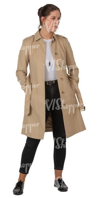 woman in a trenchcoat standing