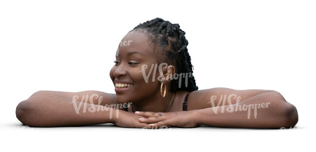 woman leaning on the edge of the pool