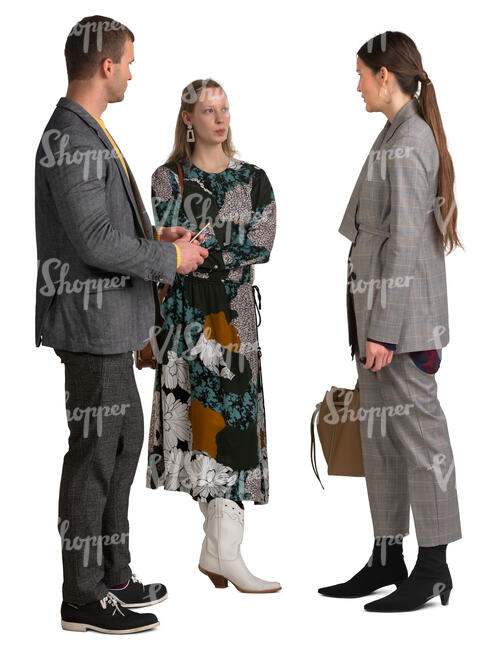 group of three people standing and talking