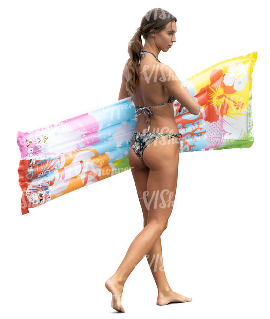 woman with a swim mattress walking