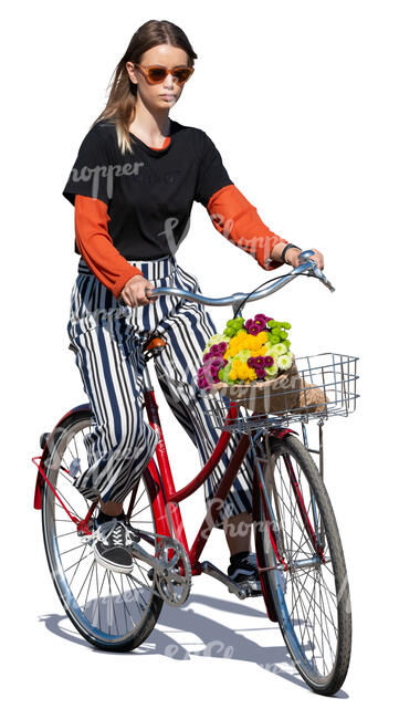 woman riding a bike on a sunny day