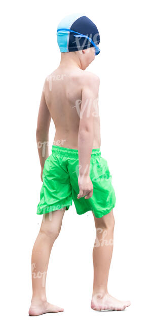 boy in swimming trunks walking