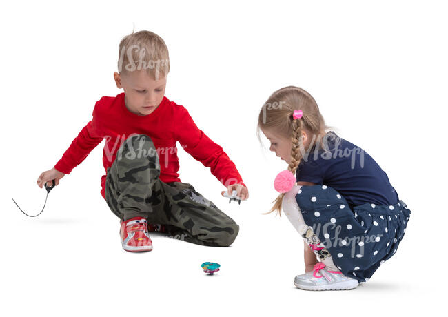 little kids playing on the floor