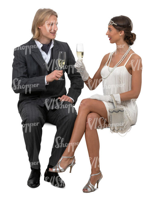 man and woman in fancy clothes sitting and drinking champagne