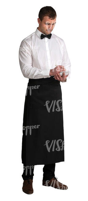 waiter standing and taking an order