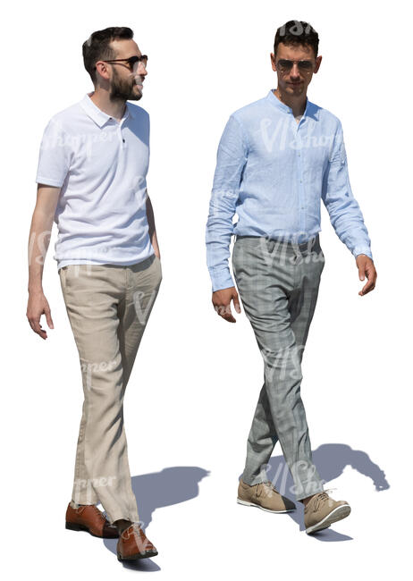two men walking and talking on a summer day