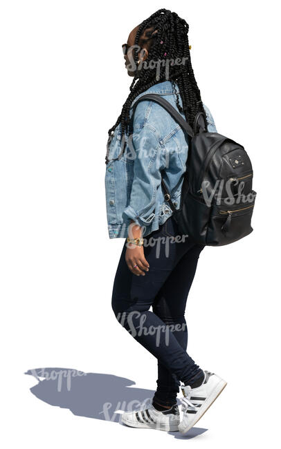 black woman with a backpack walking