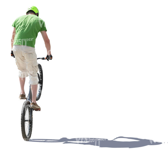 young man doing a stunt on a bike