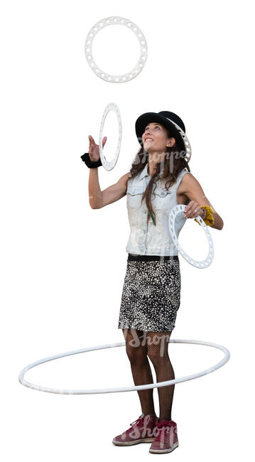 female street artist with a hoop and joggling 
