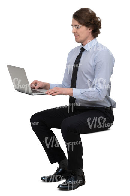 businessman sitting at a desk and working with computer