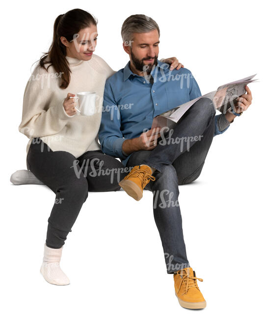man and woman sitting ona sofa together