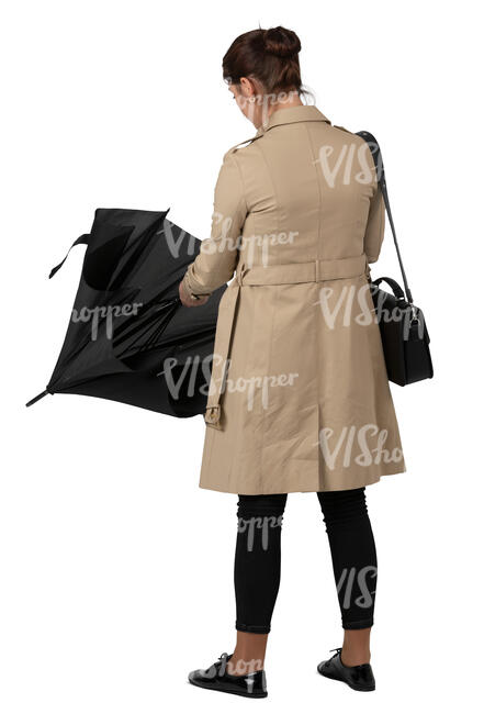 woman standing and opening an umbrella