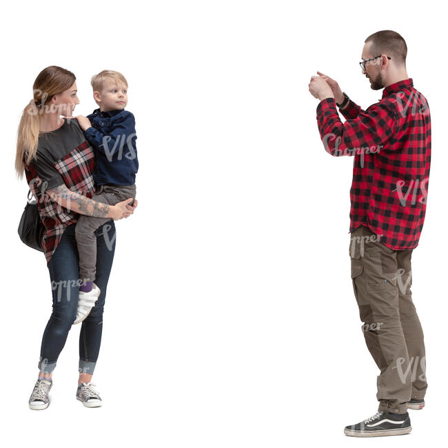 man taking picture of a woman holding her son