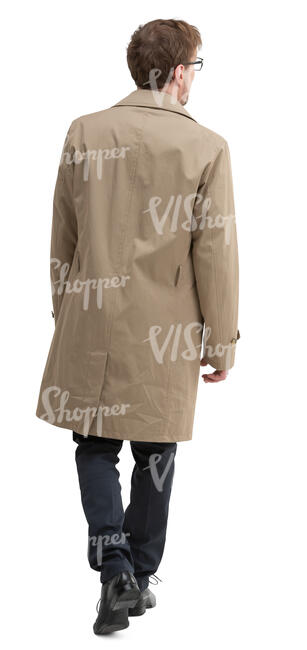 man in a trenchcoat walking