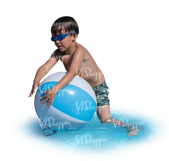 little boy playing with a beach ball in the water