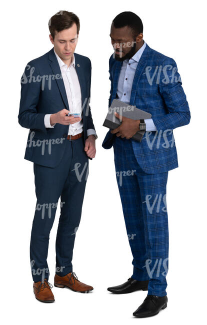 two men in suits standing and looking smth from a phone