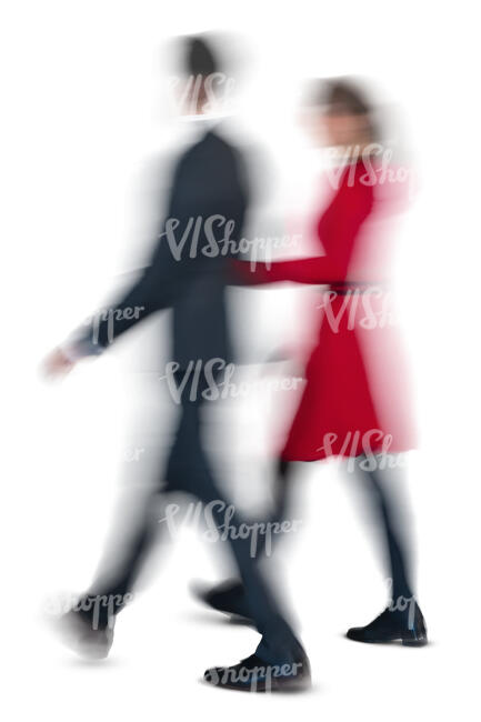 motion blur image of a man and woman walking