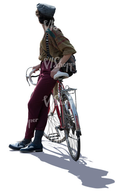 backlit woman leaning on a bike