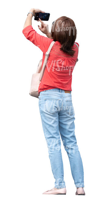 woman taking a picture seen from below