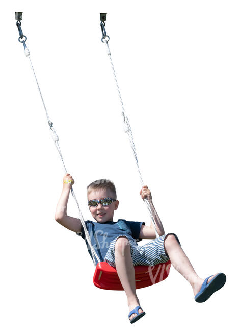 little boy swinging