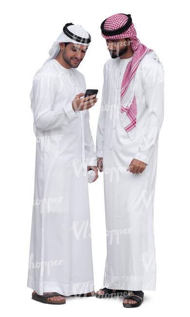 two emirati men standing and looking at a phone