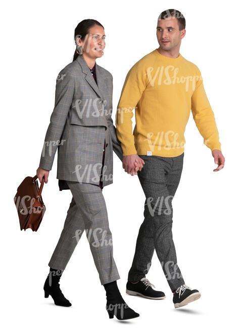 man and woman walking hand in hand